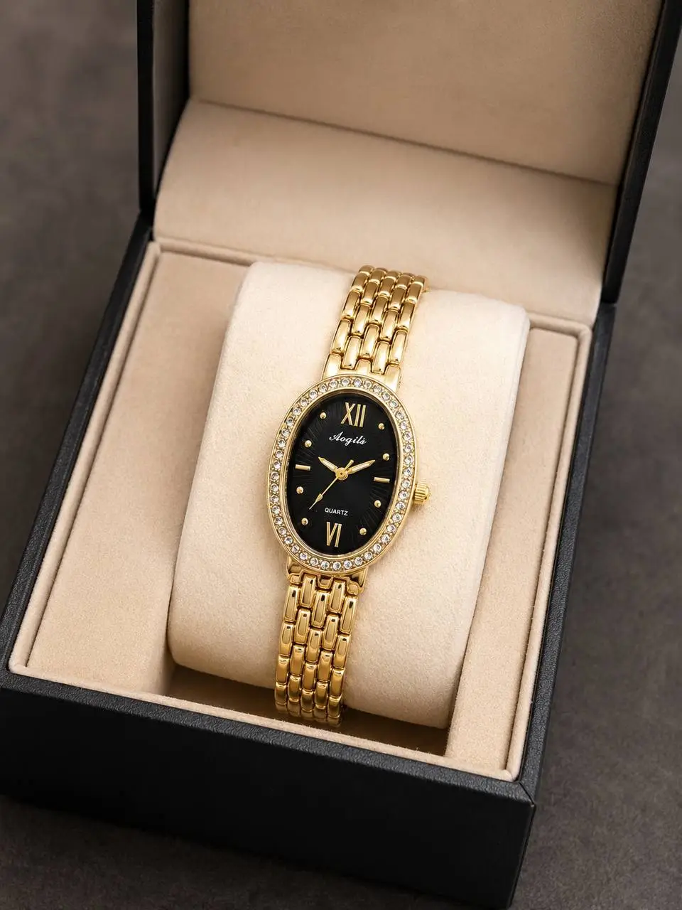 Montre Femme Dorée Ovale – Cadran Noir & Cristaux